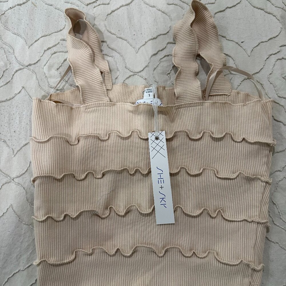 She + sky. Top size  Large